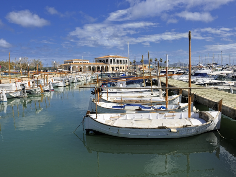 Llaüts moored at the quay of Puerto de Pollensa