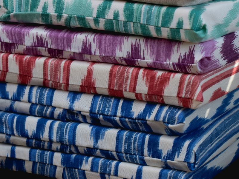 Pile of 'llengües mallorquines' fabrics in different colours